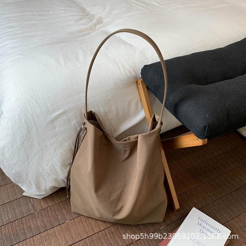 

Canvas bag women s large-capacity messenger bag Lazy wind women s shoulder bag Student tote bag shoulder bag коричневый