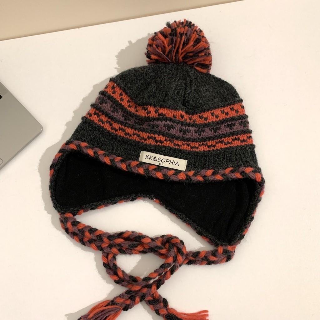 

Chic Cozy Knitted Winter Hat For Women Featuring Colorful Pom Poms Warmth And GrayRed