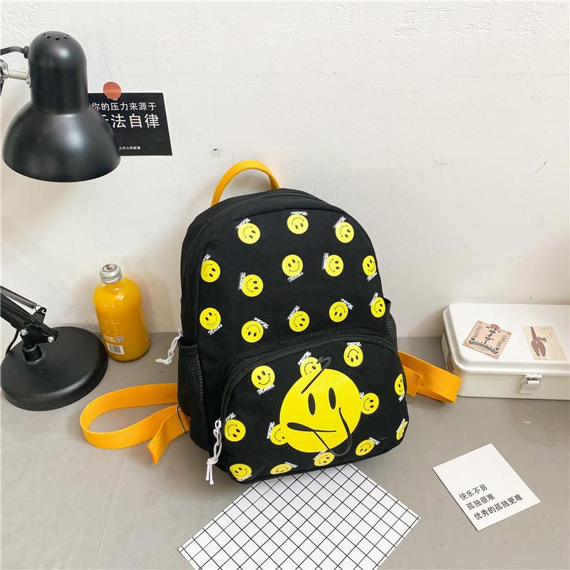 

Adorable Cartoon Smile Children Backpack For Boys And Girls With Spacious Design And Durable Nylon Fabric чорний