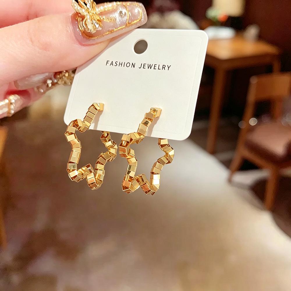 Exquisite Retro Silver Foil Star Earrings - Women's Unique Design