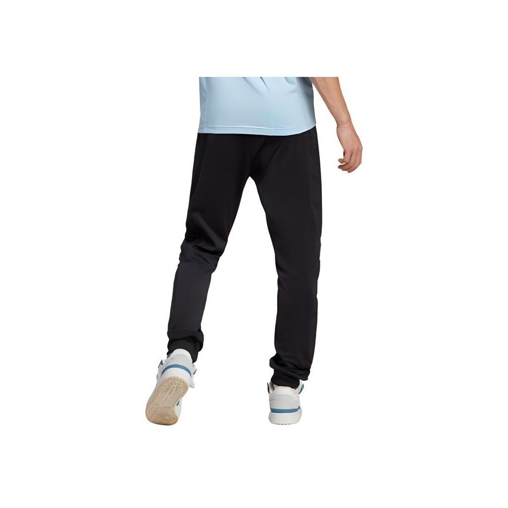 Adidas Jednobarevné ležérní tepláky s úzkými nohavicemi a středním pasem pro muže Černá IC5980