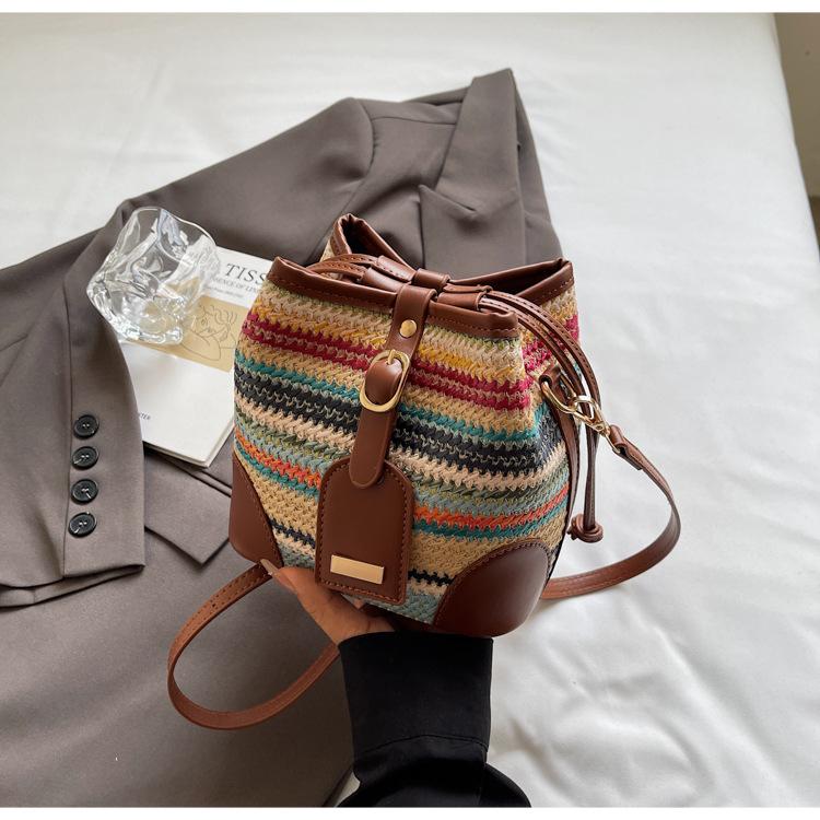 

Повседневная соломенная плетеная сумка-ведро в иностранном стиле, женская, 2025, новый нишевый дизайн, плетеная сумка-мессенджер, пляжная сумка для морского отдыха