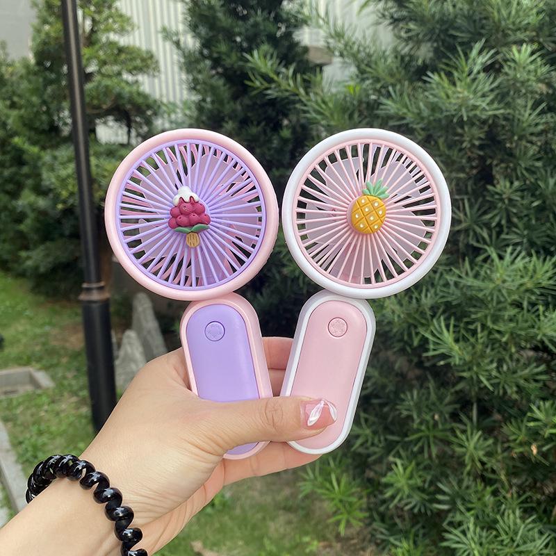 USB Rechargeable Mini Handheld Portable Fan - Compact & Minimalist Design for Summer.