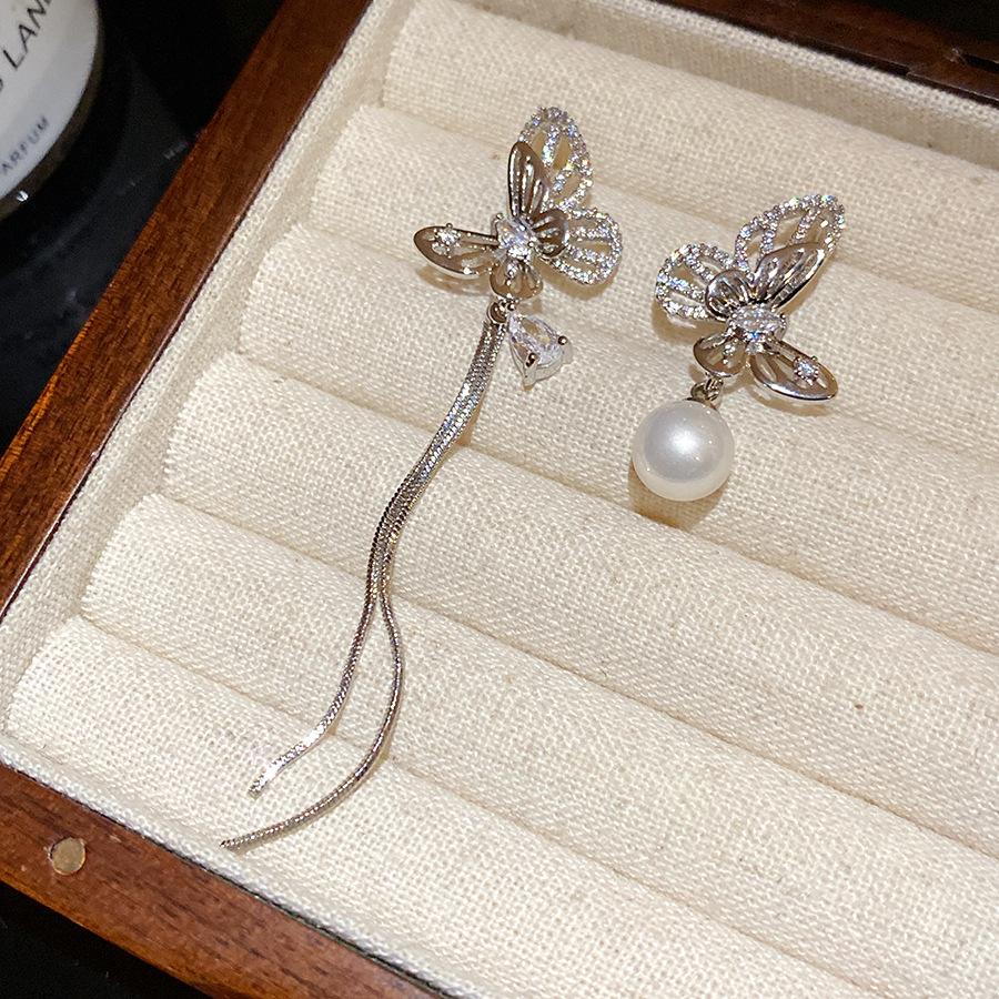 Silver needle zircon hollow butterfly pearl fringed earrings individual cold wind temperament stud earrings niche high-end earrings