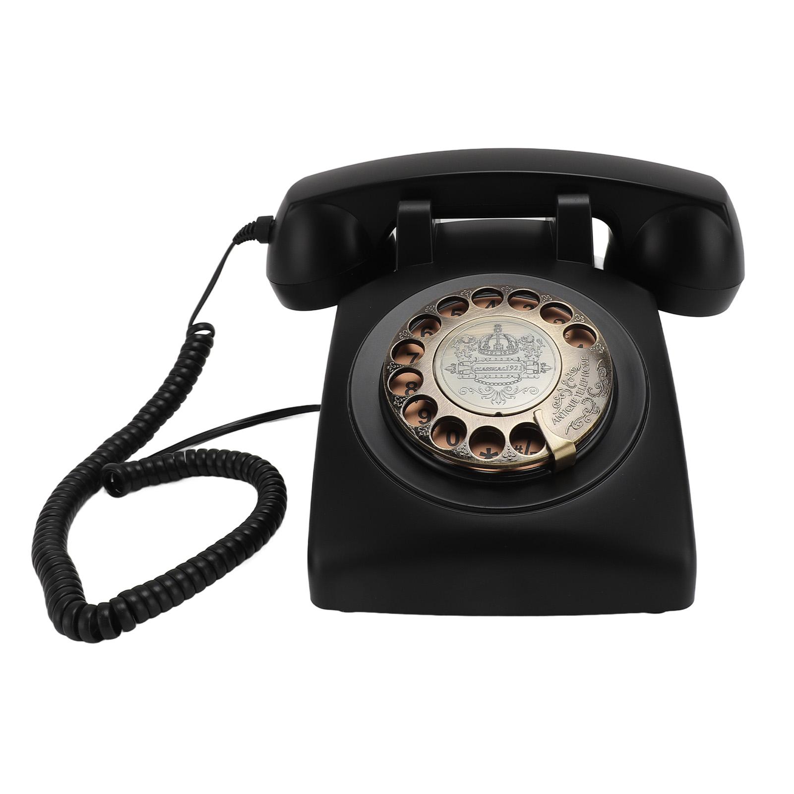 

Ретро-телефон с дисковым набором в стиле 1960-х годов. Винтажный дисковый телефон. Старомодные проводные стационарные телефоны с чёрный