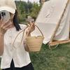 2025 new pearl buckle silk scarf women's bag handwoven messenger bag beach feng shui bucket straw bag
