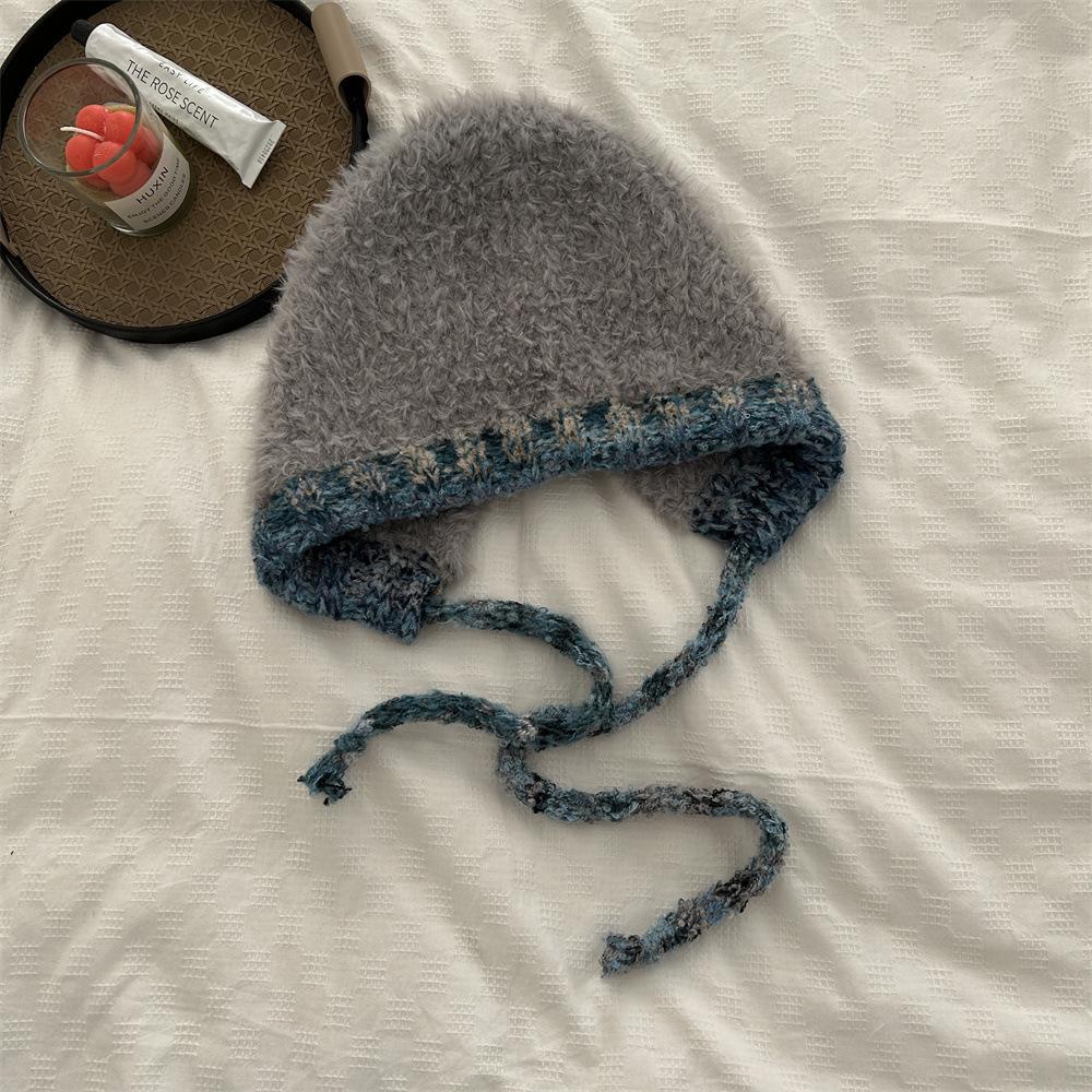Kawanishi Women's Handmade Wool Beanie with Tassel and Ear Protection