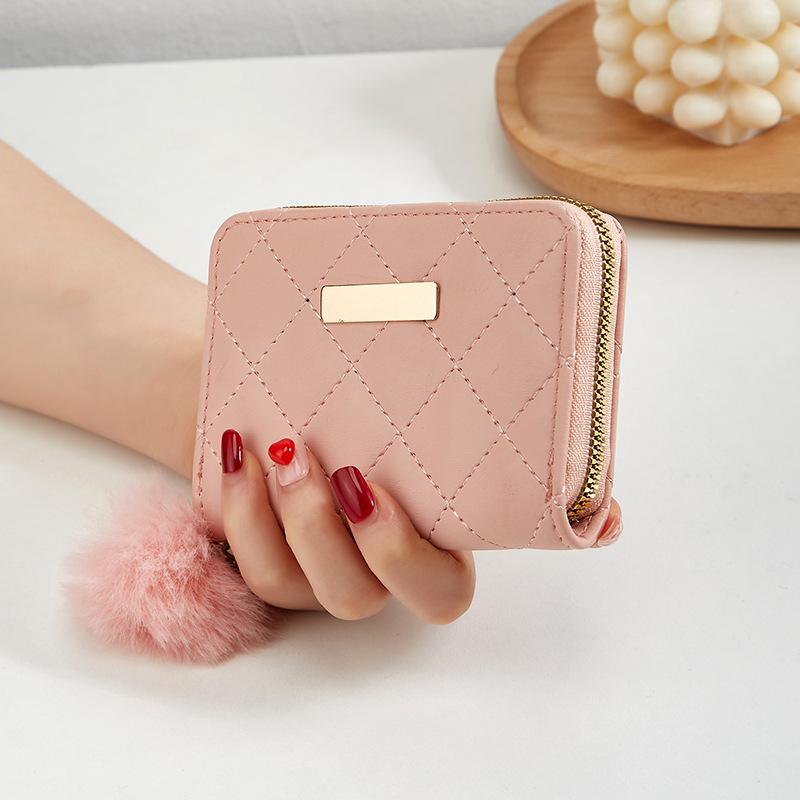 New rhombus embroidered iron sheet with hairball wallet small card bag, a women's personalized change bag