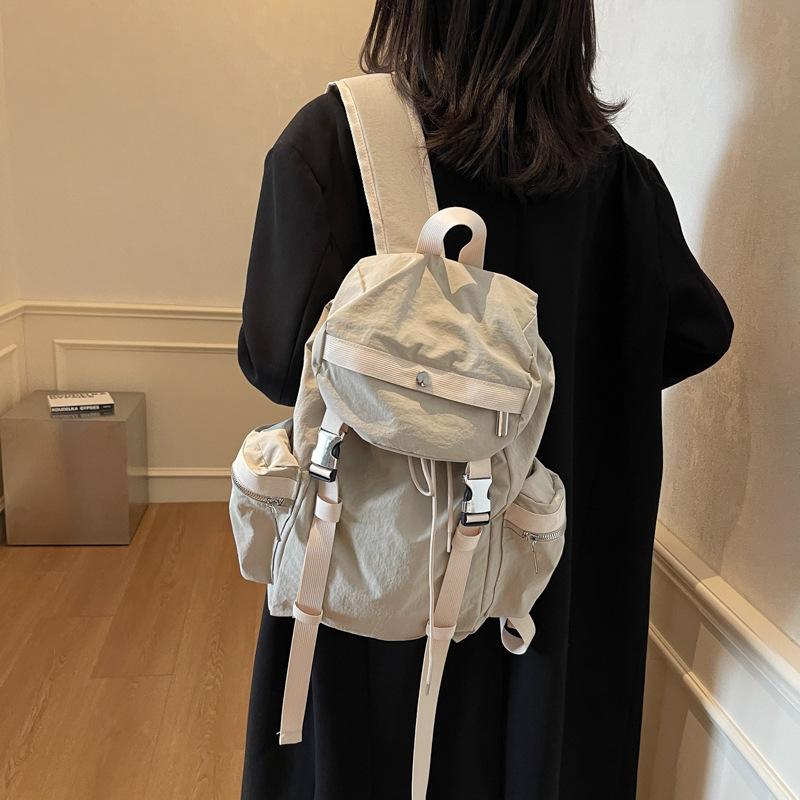 Niche design backpack female college students large-capacity travel backpack Japanese simple commuter high school students schoolbag tide