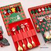 Christmas Cartoon Cutlery Set: Forks, Spoons, and Gift Box Featuring Cute Reindeer and Tree Designs.