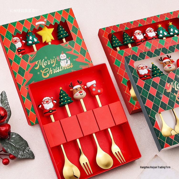 Christmas Cartoon Cutlery Set: Forks, Spoons, and Gift Box Featuring Cute Reindeer and Tree Designs.
