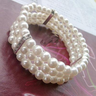 Bracciale rigido elastico elastico con decorazione di strass di perle finte a 3 file di moda