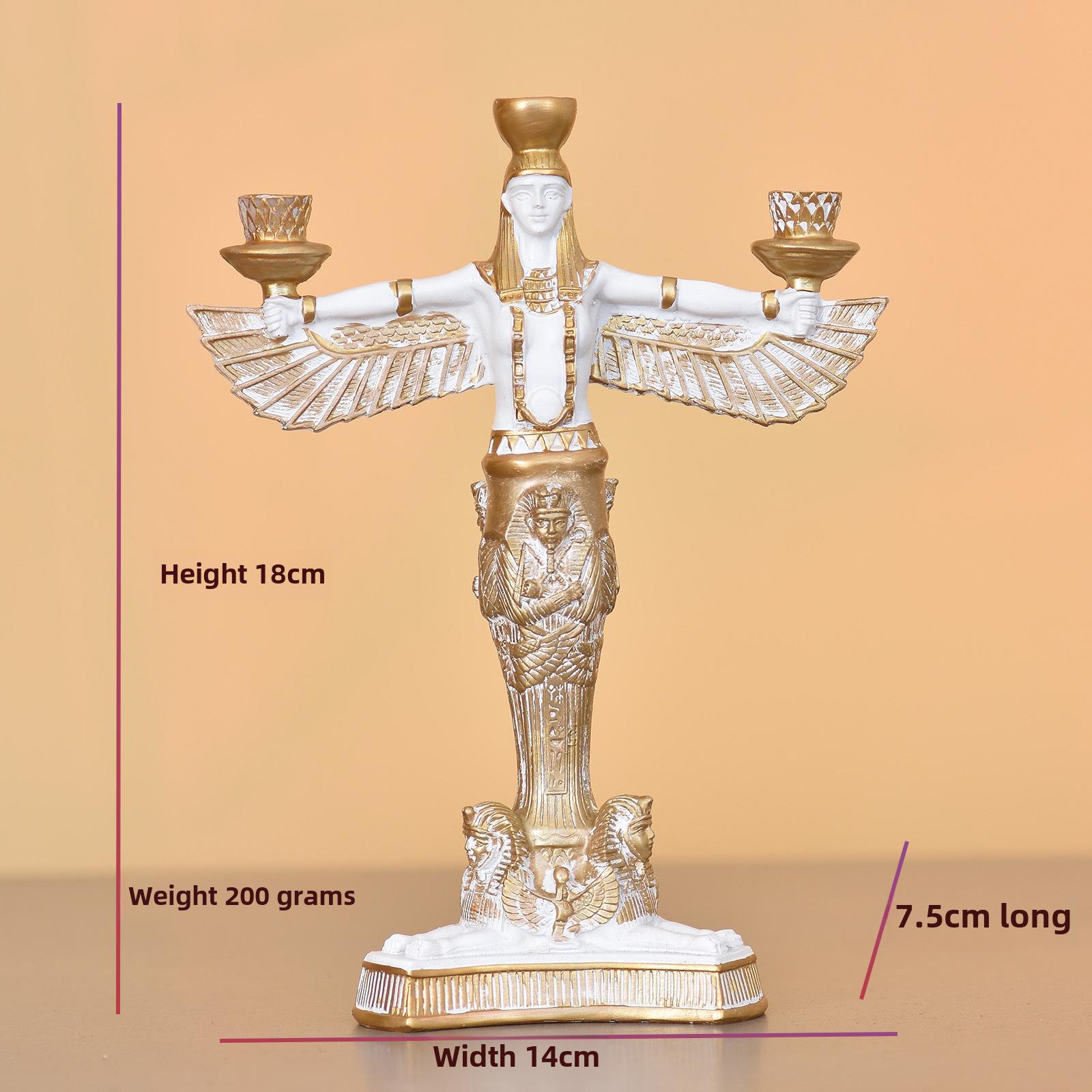 

Скульптура из смолы «Изида»: Крылатая египетская богиня, преклонившая колени на земле