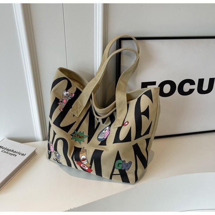 

Canvas bag Women s large-capacity printed alphabet portable shoulder commuter tote bag Fashion new хаки