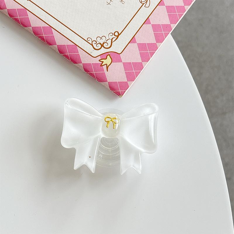 

Solid Color Girl Bow Mobile Phone Airbag Bracket Wind Paste Retractable Desktop Watching Drama Support