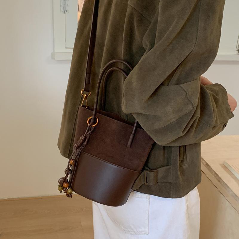 2025 new small bag women's messenger bag retro splicing handbag matte texture bucket bag shoulder bag
