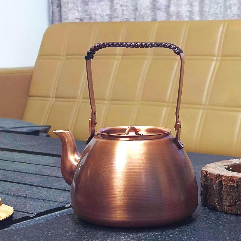Handcrafted Exquisite Copper Electric Teapot, 1L Capacity, Purple Brass Finish with Handle - Perfect for Boiling Tea.