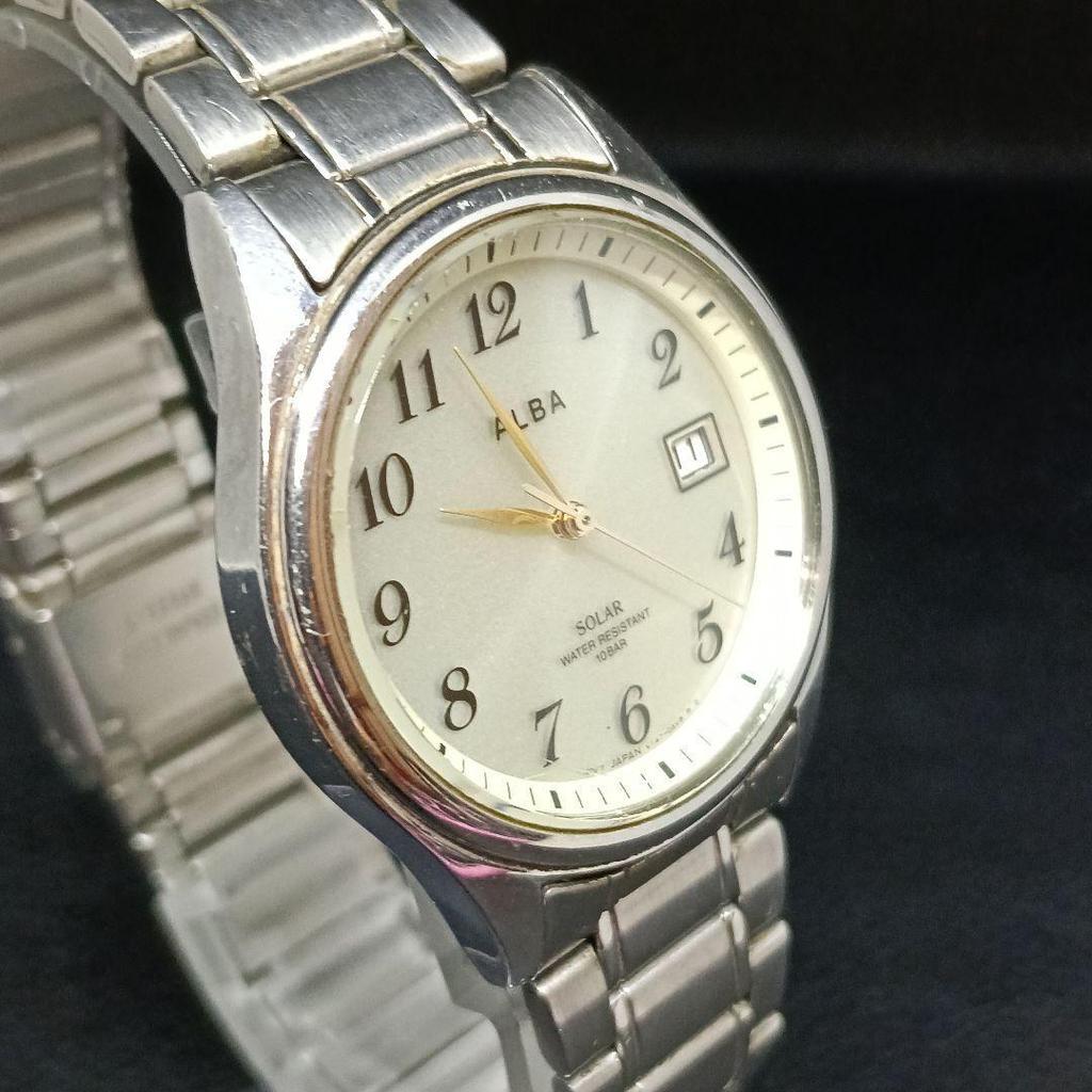 Used Working condition: ALBA men's wristwatch, solar-powered, date display, 10 bar water resistant
