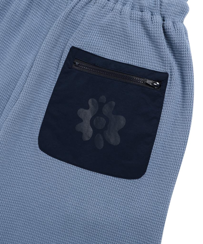 Alijibi Pokect Graphics Waffle Shorts Blue