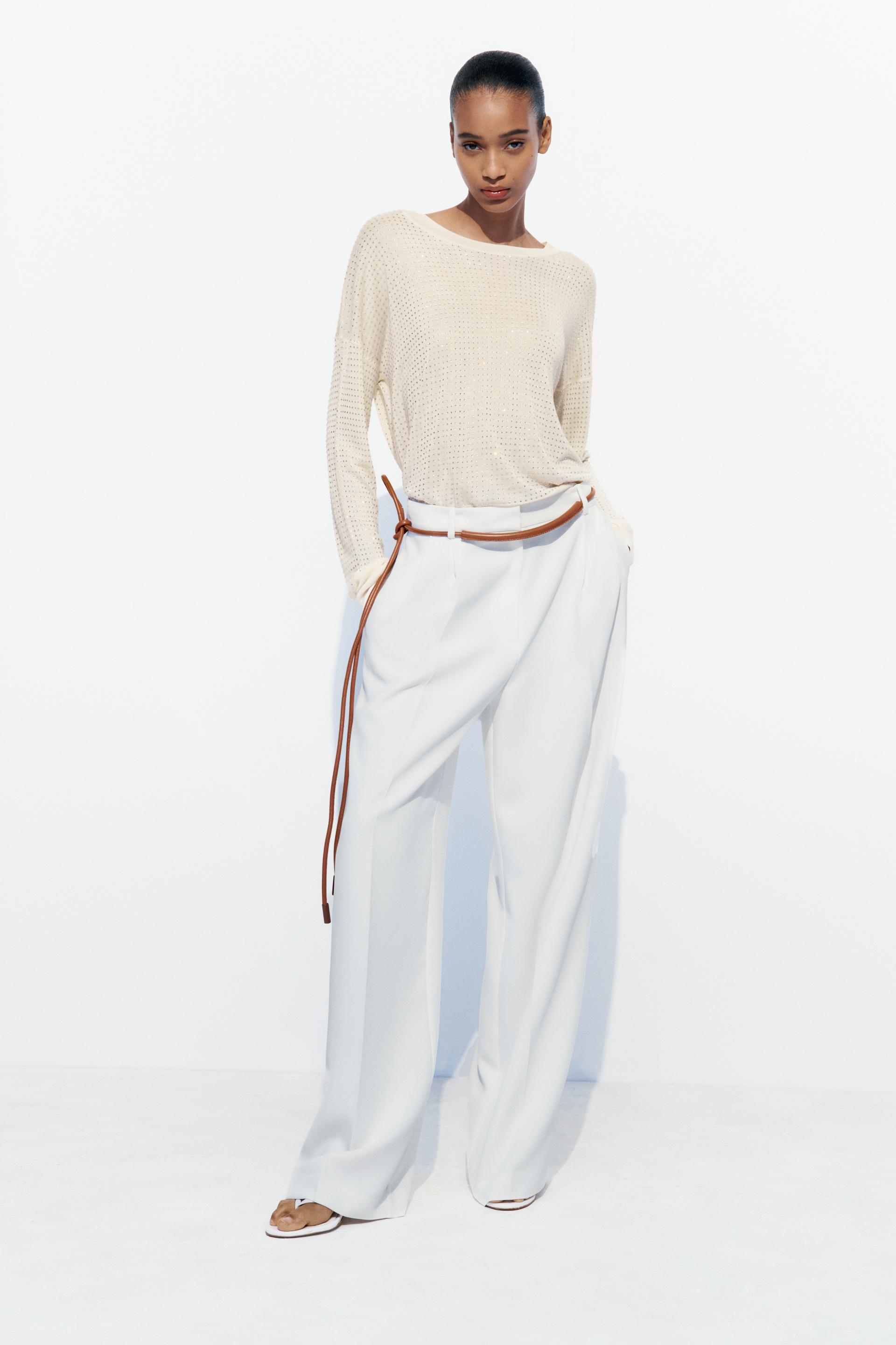 

ТРИКОТАЖНЫЙ СВИТЕР СО СТРАЗАМИ