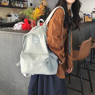 Frühling Neu Nylon Leichter Sportrucksack Ins Große Kapazität Einfarbig Studenten Schulranzen Lässiger Rucksack