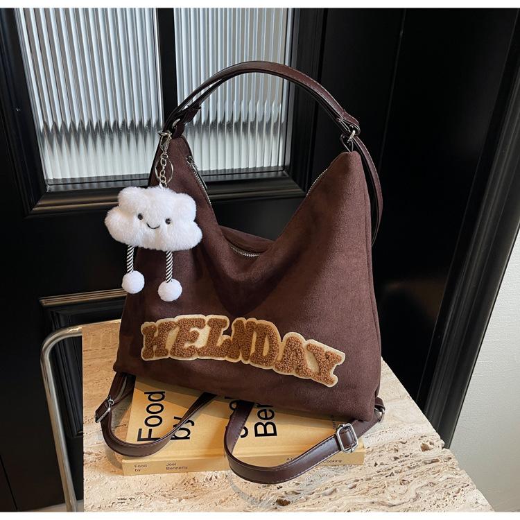 

Рюкзак Жіноча Сумка Великої Місткості 2024 Нова Осіння Сумка Через Плече Кросбоді Преміальна Сумка-Тоут для Поїздок темно-коричневого кольору