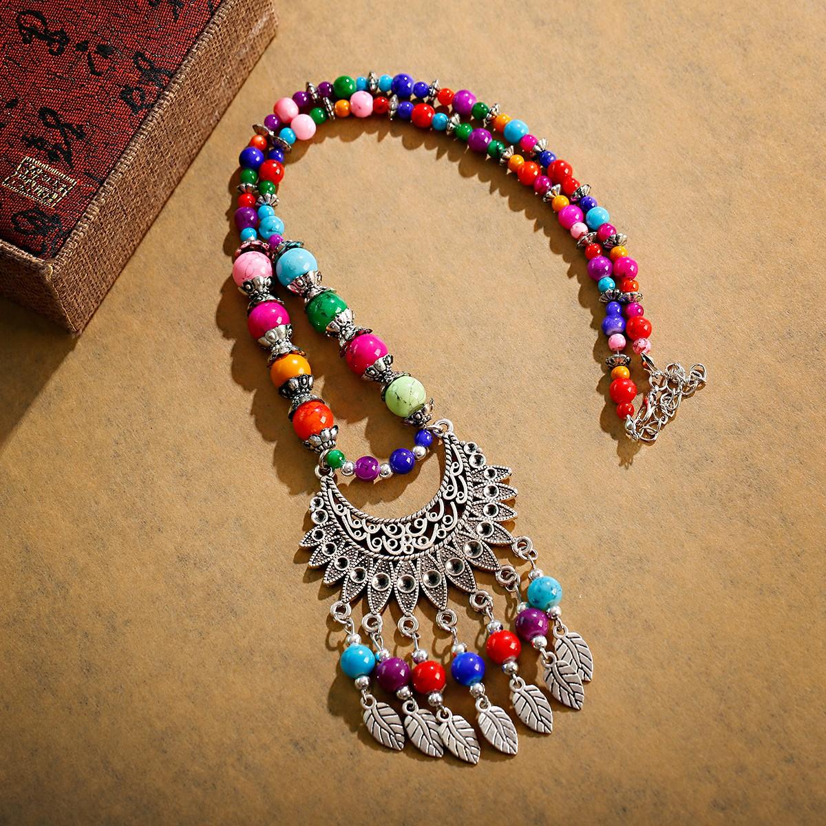 

Богемный этнический стиль Натуральный камень Бирюза Ожерелье Сплав Подвеска Металлическое перо Кисточка Ожерелье Циркон Аксессуары Женское