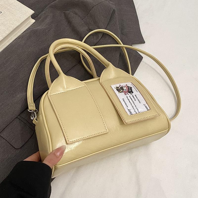 2025 new Japanese casual simple and sweet portable Boston bag versatile commuter high-quality messenger bag women