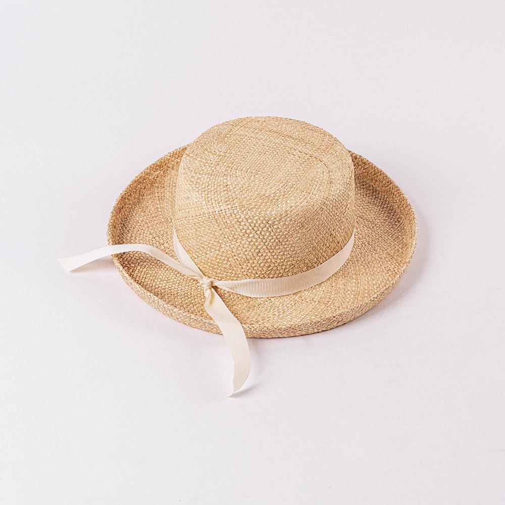 Children's spring and summer fashion casual bow flat top warped edge treasure straw hat outdoor shopping travel sunscreen sunshade straw hat
