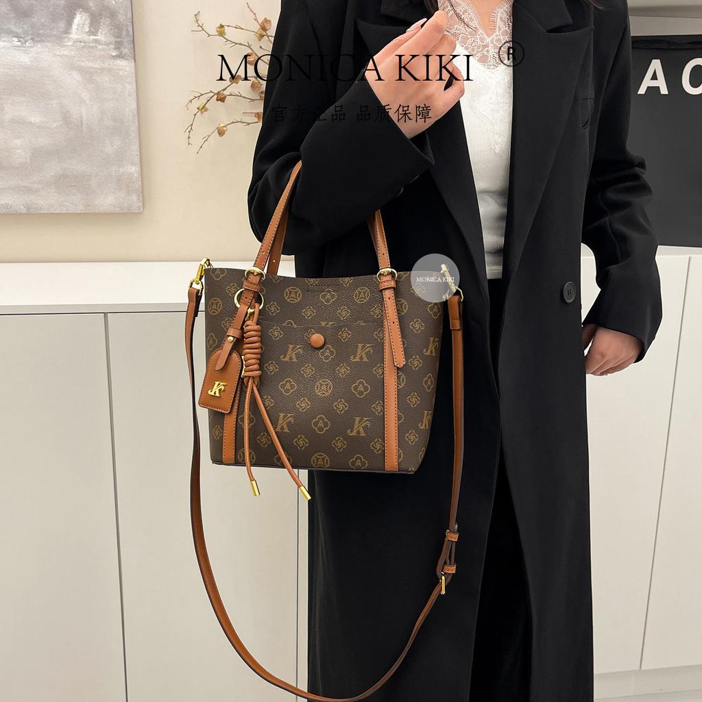 Monica Qiqi single shoulder oblique span bag female foreign versatile multi-layer portable high-end textured bag large capacity fashionable