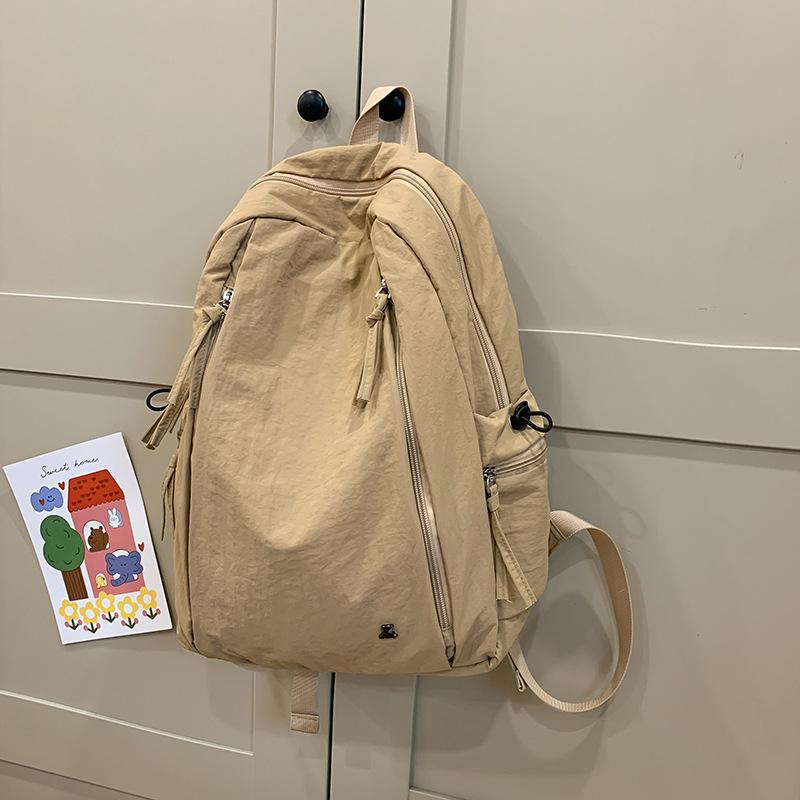 Japanese casual schoolbag female college student simple solid color backpack female versatile lightweight junior high school student computer backpack