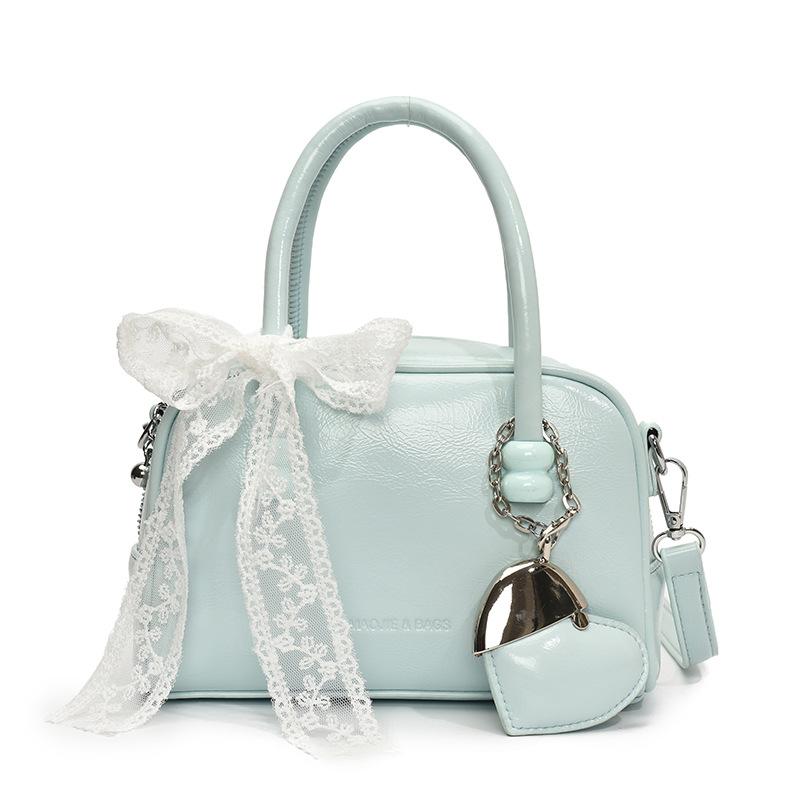 Korean version of the hot sale niche simple solid color hand pillow bag versatile fashion high texture commuter messenger bag women