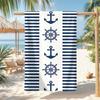 1pc of Navy Blue Striped Beach Towel Featuring an Anchor And Steering Wheel Design, It Has a Classic Nautical Style with