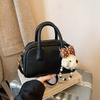Han Niche Fashion Portable Boston Bag Women's 2026 Spring New Light Luxury Shoulder Messenger Bag