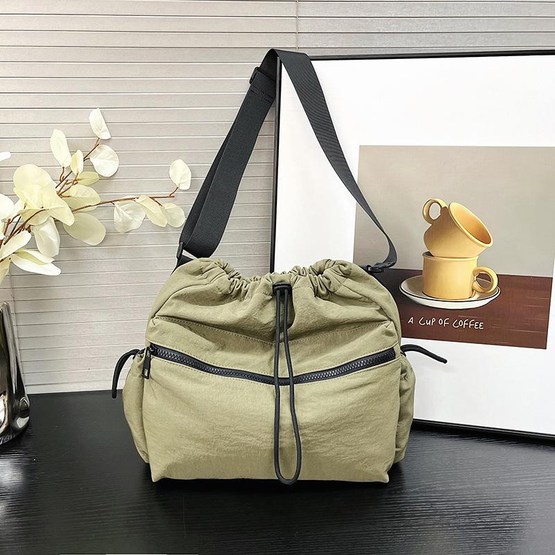 2025 new Japanese drawstring tote bag girls casual large-capacity niche design casual shoulder messenger bag