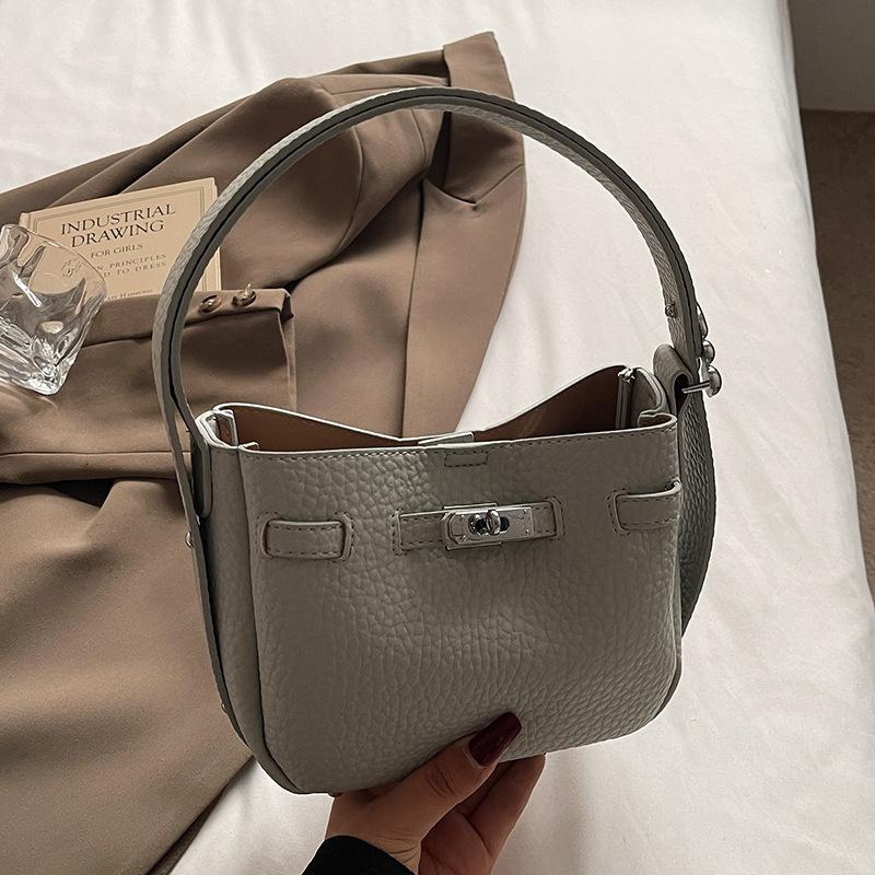 

Wholesale high quality lychee pattern portable bucket bag fashionable commuter style versatile women s shoulder messenger bag