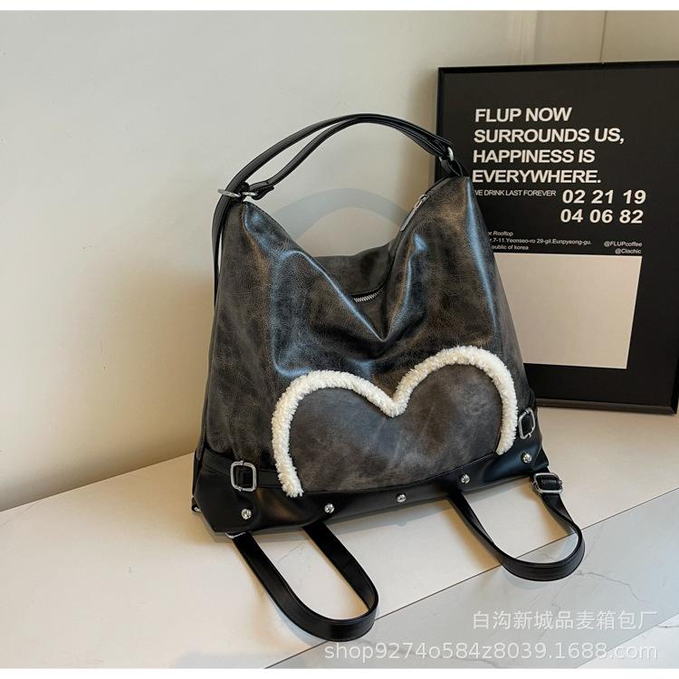 

Korean version of casual large-capacity underarm bag women s bag 2025 new simple commuter tote bag versatile backpack чорний