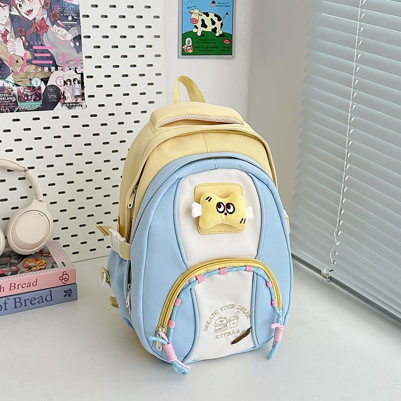 

High value, fresh and sweet, contrasting color splicing backpack, light outing backpack for junior high school students