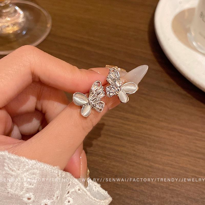 

Korean version flash diamond opal butterfly stud earrings female design earrings Internet celebrity ears