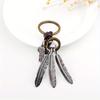 Vintage Pendant Hand Woven Leather Keychains for Men Car Key Chain Women Tassel Feather Keyring Charm Jewelry Friends Gift