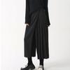 Pantaloni da donna stile scuro nero tinta unita plissettati finti due pezzi irregolari high street larghi gamba larga casual individuali lunghezza a metà polpaccio pantaloni culottes