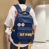 Korean ins style high appearance Harajuku trendy couple backpack junior high and high school students light and large capacity schoolbag girl