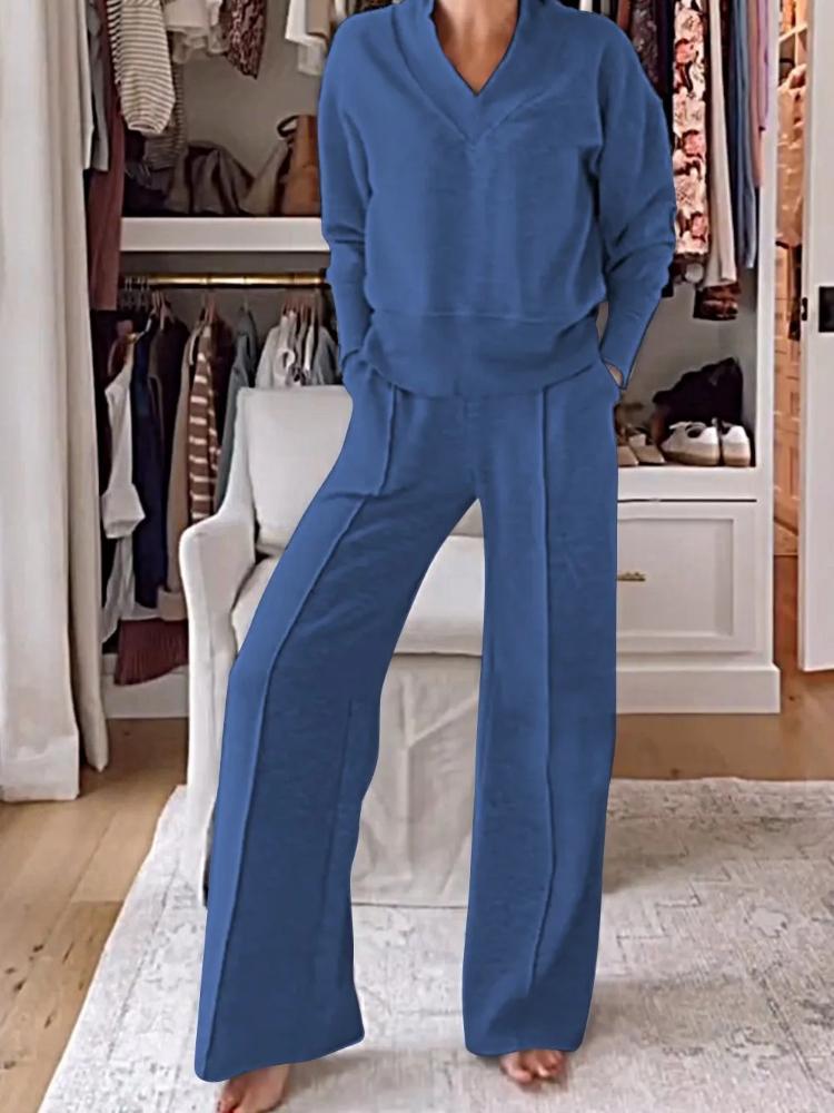 

Осенний повседневный комплект из двух предметов: свободный топ с V-образным вырезом и длинными рукавами и брюки широкого кроя. 3XL синий