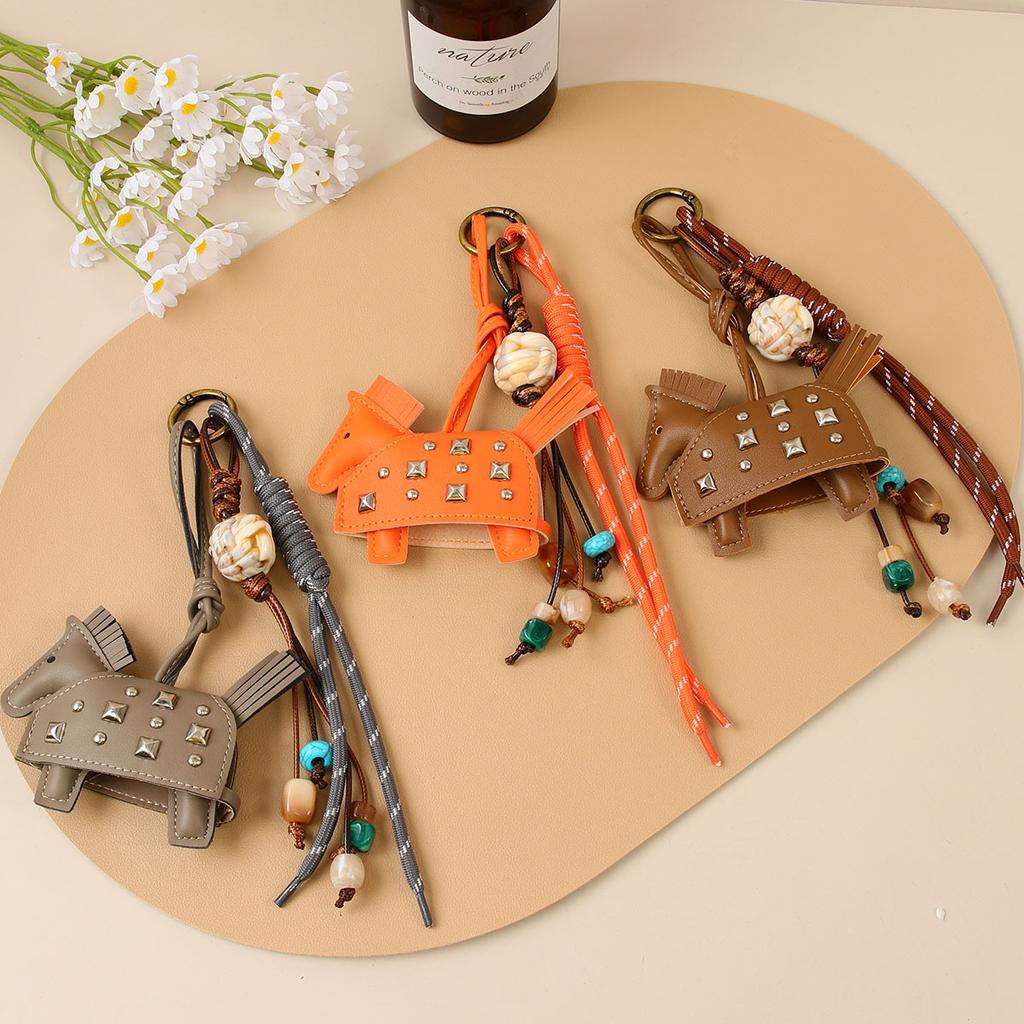 Pony beaded braided rope pendant car pendant key pendant pu leather new rivets war horse bag pendant