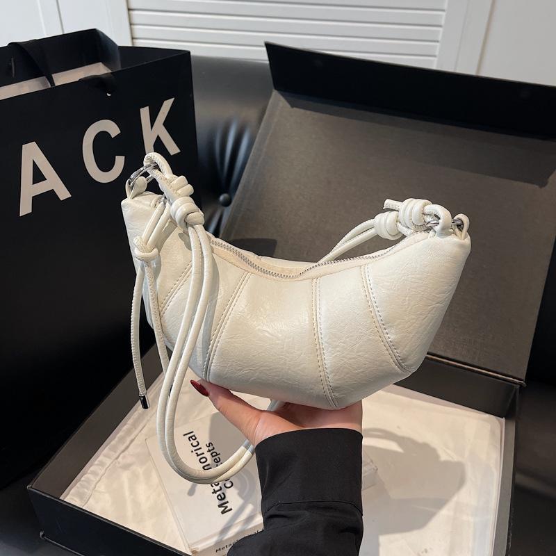 Super fire niche splicing bag women's 2025 new spring and summer versatile messenger dumpling bag popular croissant bag