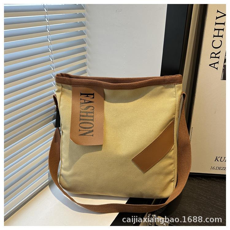 Spring Crossbody Simple Fashion Literary Niche Canvas Women's Tote Large Capacity One-shoulder Commuter Casual Bag Trend