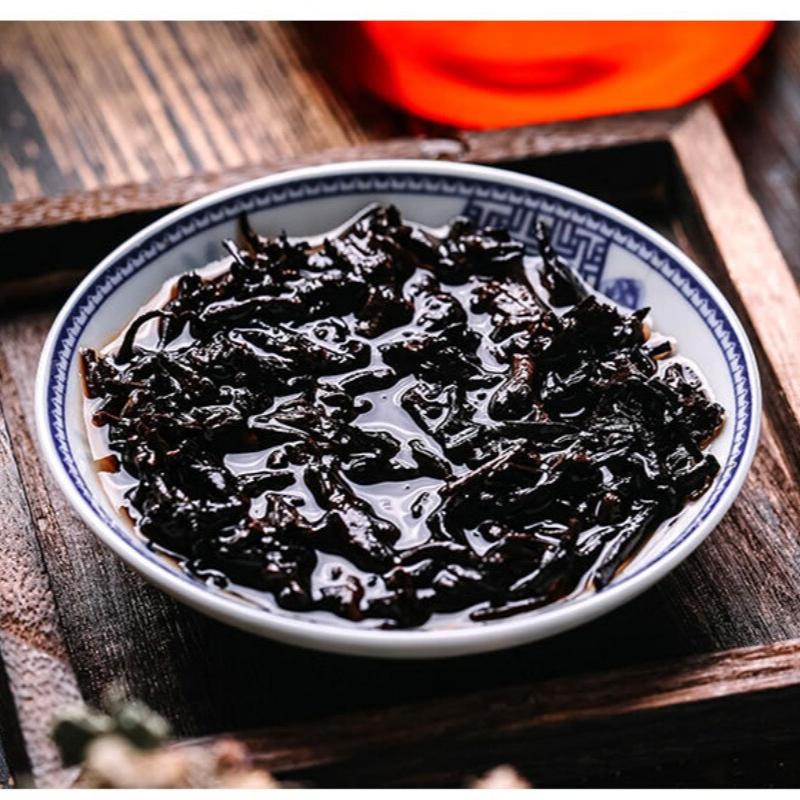 Yunnan Drakenparel Rijpe Pu-erh Thee Premium Mini Tuo Ballen 500g