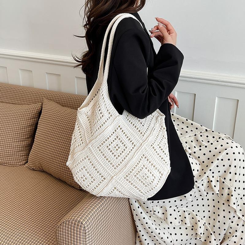 Korean version of fashion hollow knitted bag women's large-capacity seaside vacation shoulder bag versatile woven tote bag