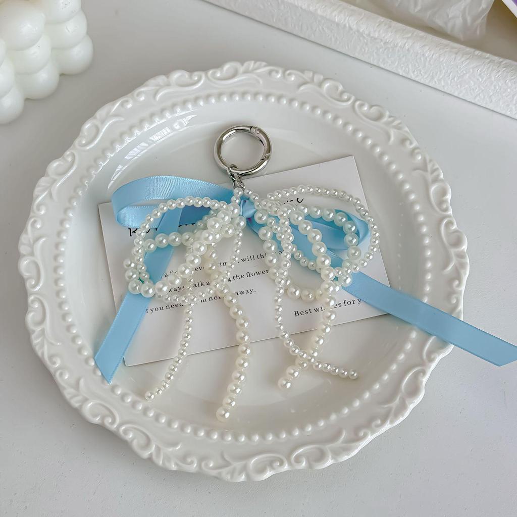Chaveiro Coração com Laço de Pérola de Luxo Coreano Pingente de Bolsa