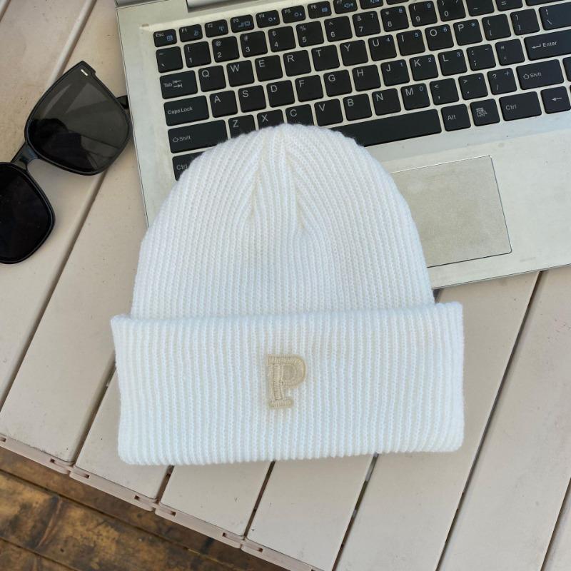 Hat winter female high-value round face student versatile cold-proof warm face small knitted wool hat